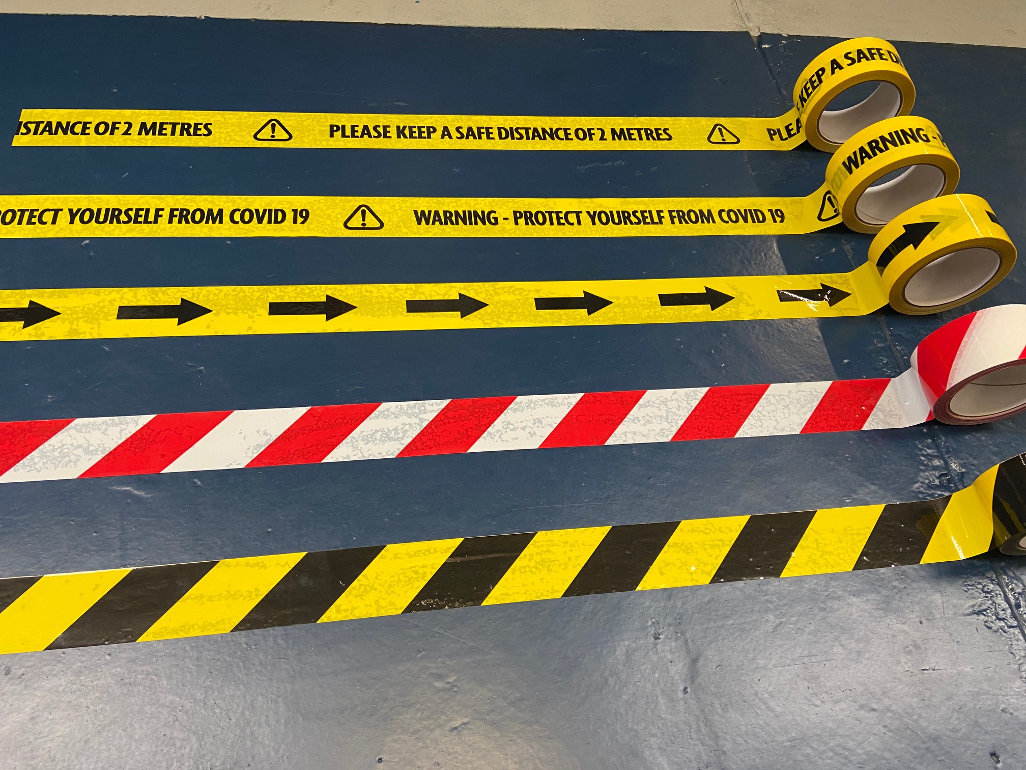 social distancing tape, hazard tape and warning tape